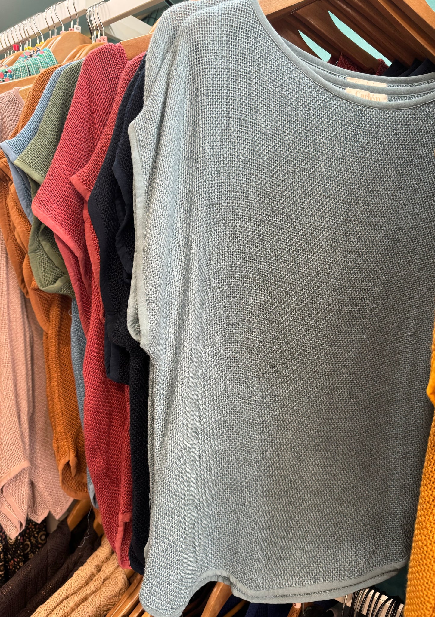 Denim blue hessian short sleeved top, with round neck. 